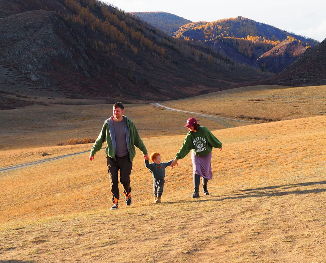 Family walking in open country