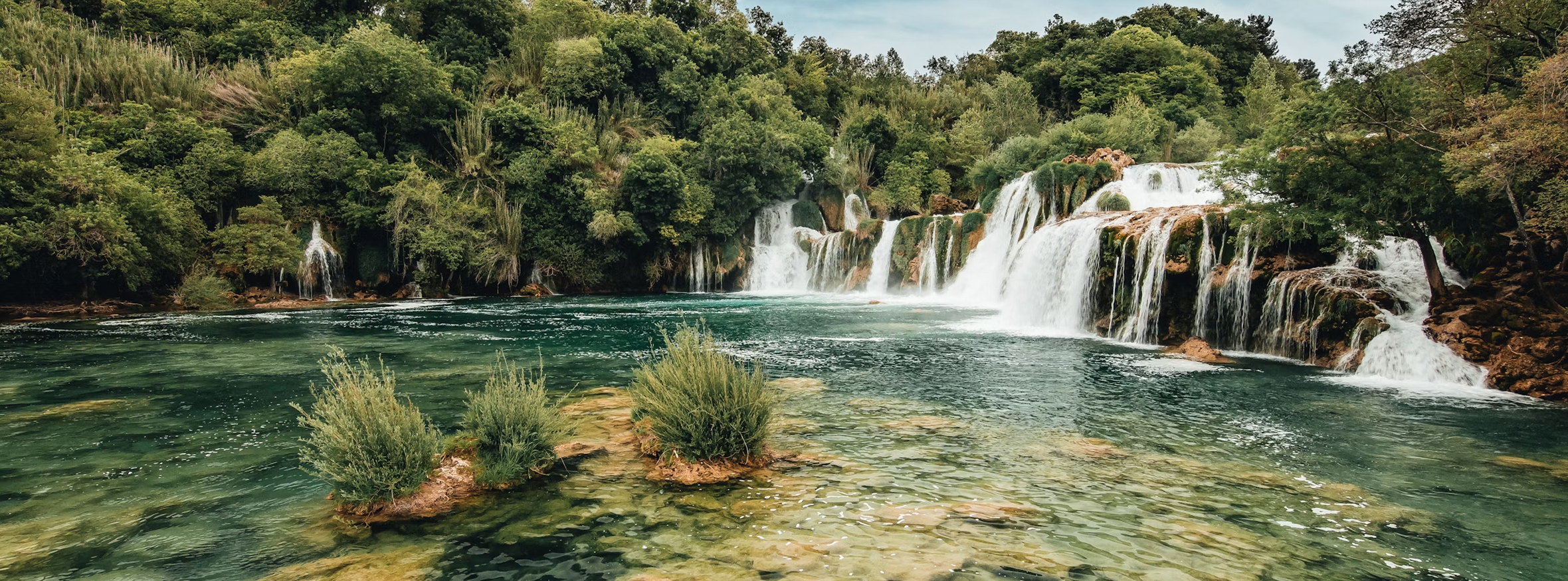 Waterfalls in a forest river
