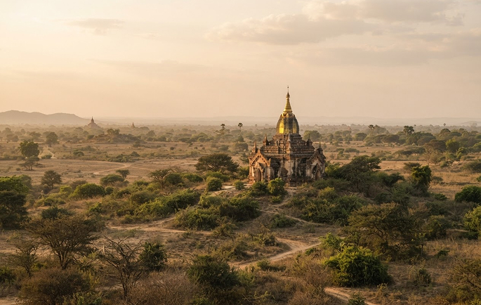 A solitary temple on a hill in the Bagan plain